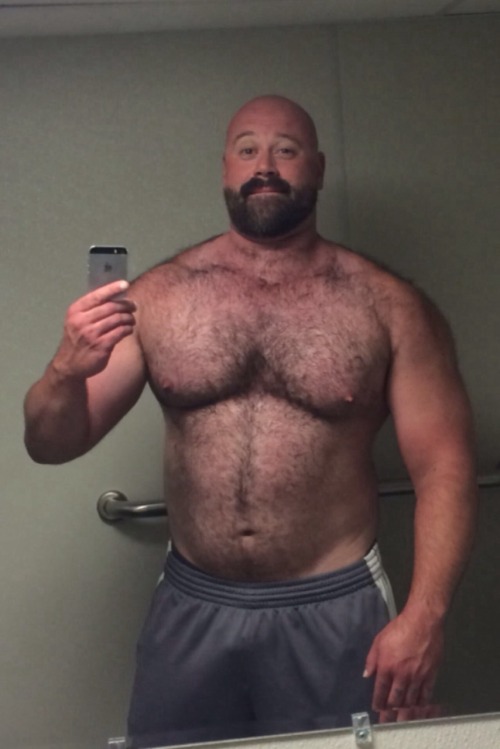 Bald muscle men with beards