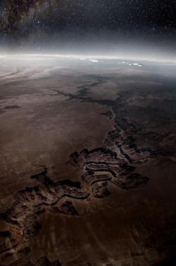 Distance lends enchantment to the view. ~ Mark Twain (Grand Canyon photographed from the International Space Station)