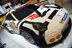 legosaurus:  Split Personality: Lego Porsche 911 RSR  Half real. Half Lego. 380,000 Lego bricks make up 50% of this Porsche. Image by  Kev Cook 