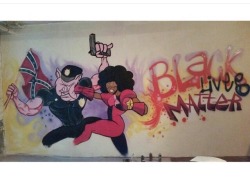 mrcincity:  beachcityboardwalk:  swagintherain:  “BLACK LIVES MATTER” by Markus Prime    No blog should be without the image of Garnet falcon-punching a racist cop.  This is awesome!!   But all lives mat- *gets jaw broken in two by Garnets’ other