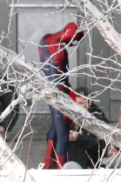 fuckyeahgaygeeks:  sassygayelk:  andrwgarfield:  First pictures of the new Spidey suit on set (Feb 25)  i thought this was a picture of spiderman getting a secret blowjob by a male prostitute  So. Did. I. 