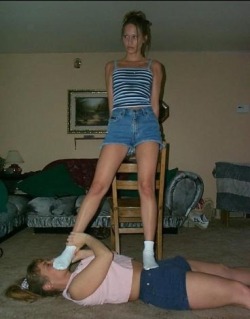 whiskeynpills:  My neighbor atop my then gf (1999) in what was a one sided match. Lindsey wanted to pose after the fact and grabbed the chair and kicked off her shoes, unfortunately she never went barefoot :( 