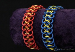 links-to-the-past:  Introducing the Team Fortress 2 inspired RED team and BLU team bracelets! Show off your allegiance to Builders League United or Reliable Excavation Demolition with these hand-crafted chainmail bracelets, made using a combination of