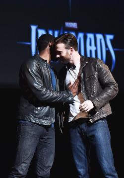 chrisevanssource:  Chadwick Boseman and Chris Evans on stage during Marvel Studios fan event at The El Capitan Theatre on October 28, 2014 in Los Angeles.  Chris has been schooling Chad on the &lsquo;left boob grab&rsquo; Unfortunately Chad missed the