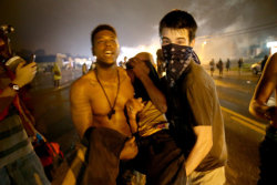 weather-underground:  anarcho-queer:  Captain Johnson Breaks Promise, Uses Tear Gas And Military Vehicles Against Ferguson Protesters August 17th, 2014 Captain Johnson broke a direct promise he made on Saturday when officers and SWAT under his control