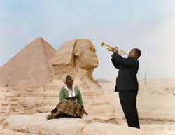  vintageblack2: Louis Armstrong plays for his wife, Lucille, in front of the Sphinx and Great pyramids in Giza, Egypt, 1961. 