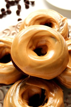 sweetoothgirl:  Peanut Butter Glazed Chocolate Donuts 