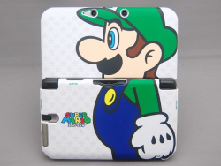 tinycartridge:  3DS XL Luigi cover ⊟ Put a big Luigi profile on your 3DS XL in this, the Year of Luigi and beyond. Play-Asia also has a version with some kind of “red Luigi” character I don’t recognize. Don’t forget to listen to our “Year