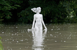  A statue in the floodwater of the Moson branch of River Danube in Gyor, 120 km west of Budapest, Hungary, on June 6, 2013. The River Danube is expected to peak on June 10 in Budapest, close to its highest level ever, 25 cm higher than the record levels
