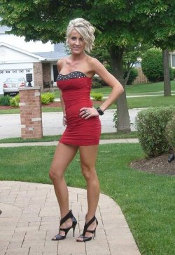 hotminiskirts:  Mature blonde in sexy red mini dress and heels. Hot!