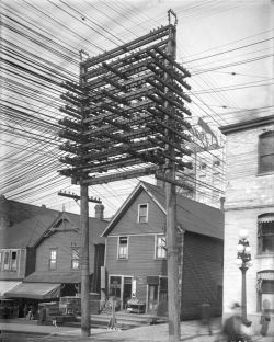 99percentinvisible:  Throwback: before most cables ran underground, all electrical, telephone and telegraph wires were suspended from high poles. 