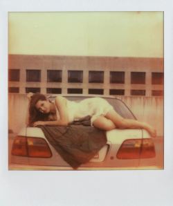 After I took a Polaroid on the back of this Civic I sent a telegram to my friends in Siam. by tessa_fowler