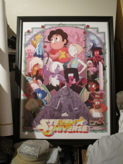Submission from @astralfitz:Finally went out and got a proper frame! Leaned a little too much when I was securing the back, so there’s a wee bit of a crack, but it still looks fantastic :] I just wish I had better lighting to show it off with.