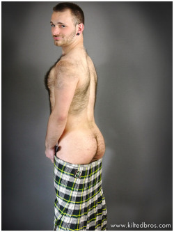 straightkiltcock:  Nicholas in (or nearly out of) the Gordon Tartan from Kilted Bros.  Kilted Bros - the “dirty, little kilt company”.