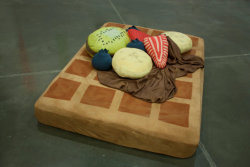 tiit:  waffle and syrup bed sheets with fruit pillows  