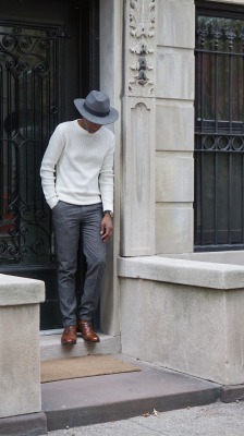blackfashion:  Get The Look: Grey Fedora Hat: (similar here) // White Waffle Knit Sweater:  (similar here) // Black and Gold Simple Watch: Shore Projects (here) // Brown Wool Plaid Pants: (similar here) // Cognac Cap Toe Boot: Stacy Adams (here)
