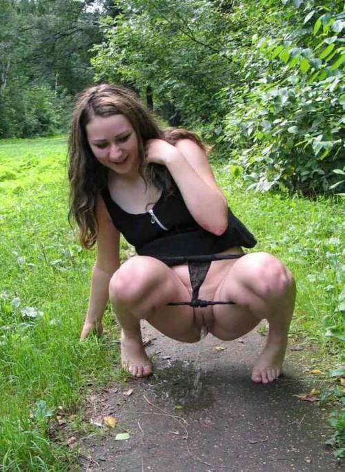 Girl pees outdoor