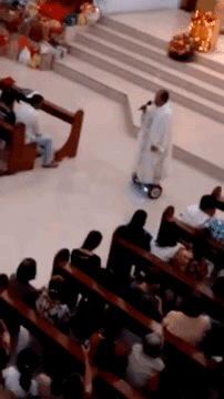 gifsboom:  Hoverboard Catholic Priest Sing During Mass. [video]  Holy Roller defined
