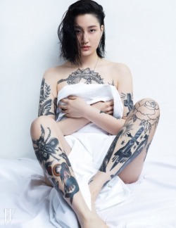 pyrrhics:  slowlyexploding:  Whew.. both tattoo artists from Korea. Might be in love right now.  kim na woo &amp; lyuhwa