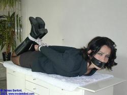 Office lady bound in boots. Very sexy.