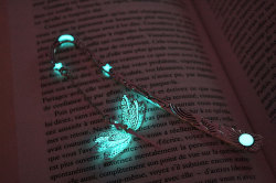 wordsnquotes:  Fairy Inspired Glow in the Dark Bookmarks by Manon RichardCanadian jewelry designer and photographer Manon Richard creates exquisite fairy inspired treasures, lockets, rings and other enchanting accessories. Richard’s spellbinding creations