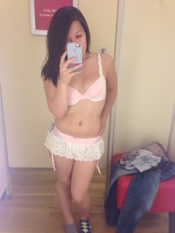 HapaSnowWhitetrying on lingerie in the dressing room