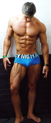 supervillainl:  Ripped muscle hunk’s dick is showing.