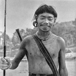 nextecuiltentetl:  A Naga warrior with tattoos on his chest representing three men he has beheaded. 