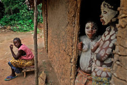 Via Olson and FarlowGirl Pygmies Hide From Whipping in Salate Village | Ituri ForestThe nKumbi is also a courtship ritual.  The boys are set free from the woodland camp periodically to come into the town where they try to sneak up on girls that they