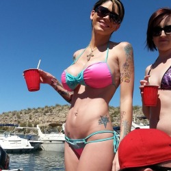 perfectorbs:  AZ lake party girl flaunting not only her big implants, but also her hot bod and dancing moves. Crazy that there is a party barge fitted with pink stripper poles.