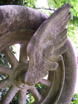 Winged wheel gravestone