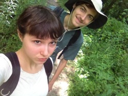 my boyfriend and I went hiking near a river and found cute bugs and here is him being cute and me being dumb in a silly photo