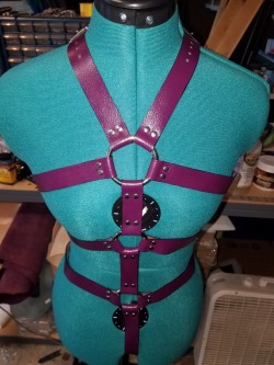dominionleathershop: Ok I completed it! Its a purple leather (pre dyed), similar to a vinyl almost….very flexible and has a little give.  There are 9 buckles on this.  This was made for a smaller frame or course.  I would love comments! 