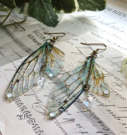 sixthpaths:  indiana—bones:  whimsy-cat:  Faerie wing jewelry by Under the Ivy.  wooowwww so pretty breadndbutterflies