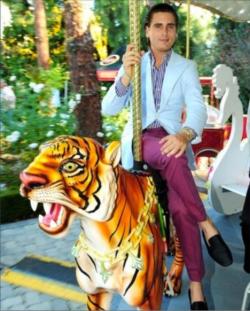 Lord Scott Disick, pictured mounting his regal Bengal tiger, adorned with the Disick-Kardashian family&rsquo;s crown jewels.