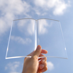 cutesign:  Book on Book, designed by TENT, is a transparent acrylic book paperweight to hold down the pages of a book from flipping as you enjoy tea and sweets outdoors while you read. ❥cutesign 