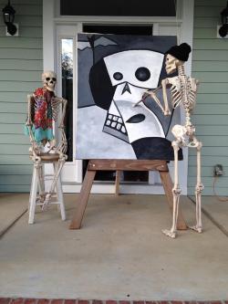spookydeerchild: kristenraemiller:  For the month of October ‘til Halloween, my dad changes up the scene of these 2 skeletons on his front porch each day for the neighbors to check out. Very creative!  Peaceful times before the skeleton war 