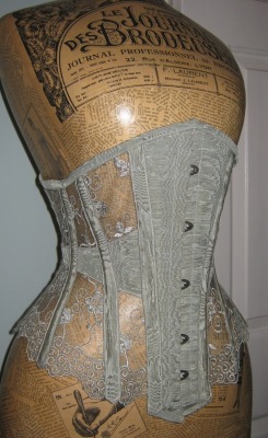 shapingcontours:  Sheer corset in lace and antique moire silk by Wyte Phantom (via Wyte Phantom) I like the transparency in the corset to wear over a nice fabric…but I also like the dress form a lot! I would love to collect old dress forms, but I don’t