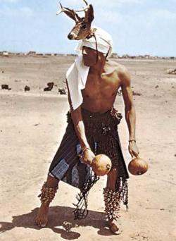 traditionalclothing:The deer dance performed by the Yaqui people of northwestern Mexico imitates the movements of the animal, which they  consider sacred. On his legs the dancer wears rattles made from moth  cocoons and filled with seeds or bits of broken