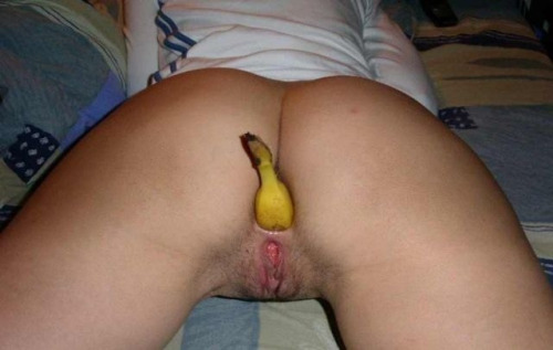 Banana in her pussy