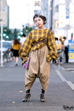 tokyo-fashion:18-year-old Japanese fashion student Juri on the street in Harajuku wearing a vintage plaid top with handmade pants (she converted a skirt into pants using suspenders), a handmade beret, Jelly Beans heels, and an Alice in Wonderland clutch.