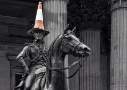 scottish-badger:  OK SO EVERYTHING YOU NEED TO KNOW ABOUT GLASGOW YOU WILL KNOW FROM THIS STATUE THIS MY FRIENDS IS THE DUKE OF WELLINGTON STATUE IN ROYAL EXCHANGE SQUARE IN GLASGOW AND YES HE HAS A TRAFFIC CONE ON HIS HEAD NOW LET ME TELL YOU I HAVE