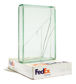 dirtyberd:  nyetscape:  Walead Beshty’s FedEx Sculptures series(2005 - present). Walead Beshty constructs glass vitrines that are the exact dimensions of a FedEx box, and he then places the glass boxes into a FedEx box and ships it to the exhibition
