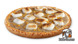 theonion: Little Caesars Marketing New Marshmallows ’N’ Gravy Pizza Directly To President DETROIT—Touting the menu item as perfect for “commander-in-chief-sized cravings,” Little Caesars this week launched an extensive marketing campaign for