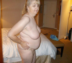 An older lady with a hanging fat belly. Who wants to bed her?More â€œsexy granniesâ€ here!