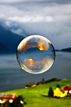 r2&ndash;d2:  Morning light reflected in a soap bubble over the fjord by (Odinodin) | Website 