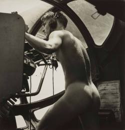 theboyfallsfromthesky:lighttothelight: gregferrell:  maleinstructor:  In the heat of battle, photographer Horace Bristol captured one of the most unique and erotic photos of WWII. Bristol photographed a young crewman of a US Navy “Dumbo” PBY rescue
