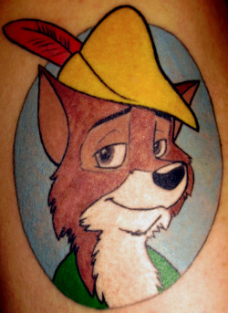 Why do I have a tattoo of Disney&rsquo;s Robin Hood on my upper left arm?  I often sleep on my right side, so even when I am completely alone, I can look at a friendly face. Robin is the first hero I ever had as a kid, and I still love seeing him to this