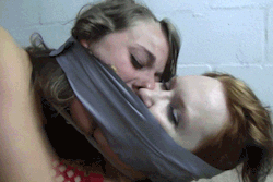 gagged4life:  damselsandothersexyness:  damselthief:  Gag level: Expert The Double Wraparound Makeout Tape Gag  This is…fucking amazing. That is all.  I definitely like the idea here, but I want to see what’s going on behind that tape. There could