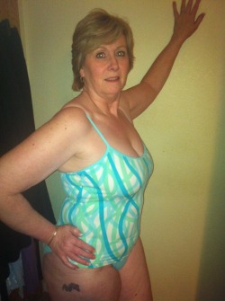 gilfsnmilfs:  Peeling off the Tankini off this Hot Grandmother to reveal Her Gorgeous Tits and A Hot, Hot Cunt!